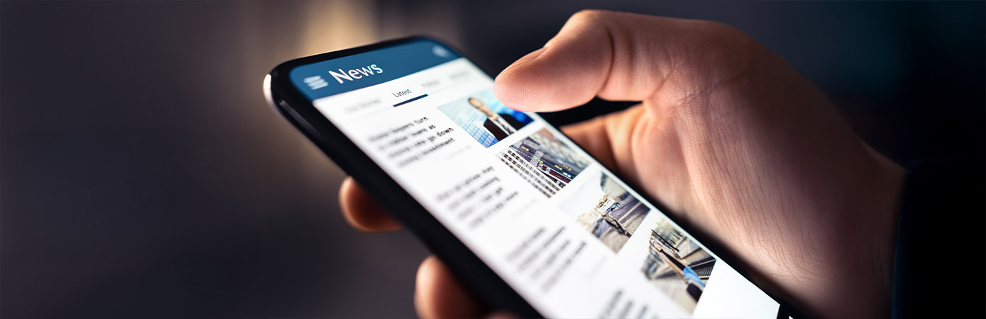 person scrolling a news feed